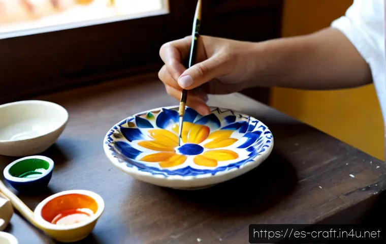 수공예 그림 그리기 - Photorealistic close-up of an adult artisan’s hands painting delicate floral patterns on a small han...